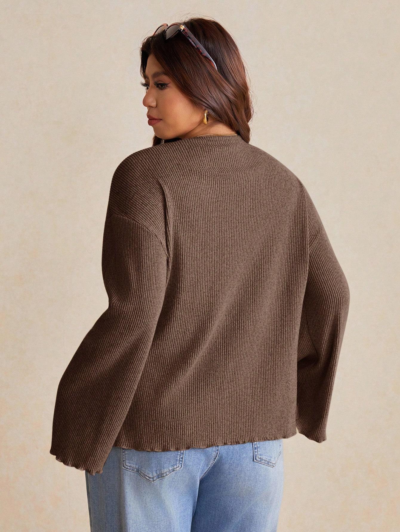 brązowy sweter guziki