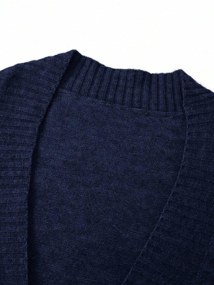 granatowy sweter długi rękaw