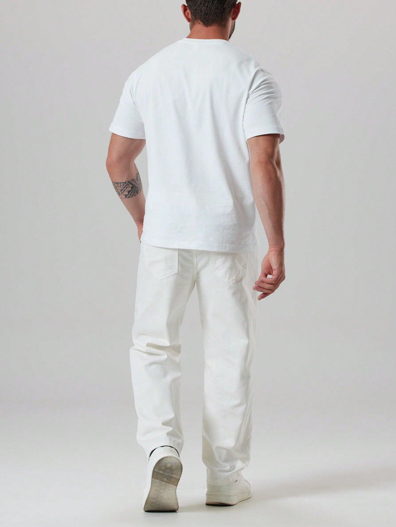 białe jensowe spodnie przetarcia