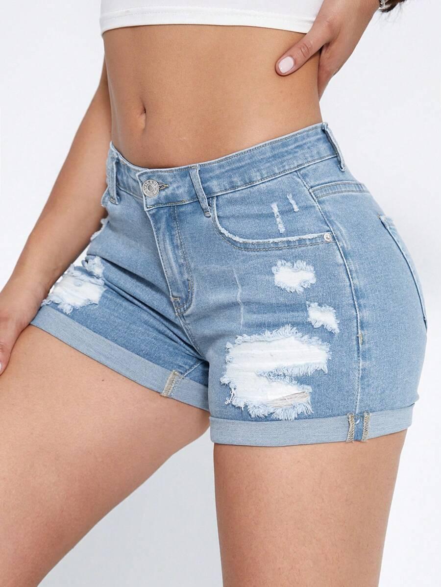 niebieskie spodenki jeans przetarcia