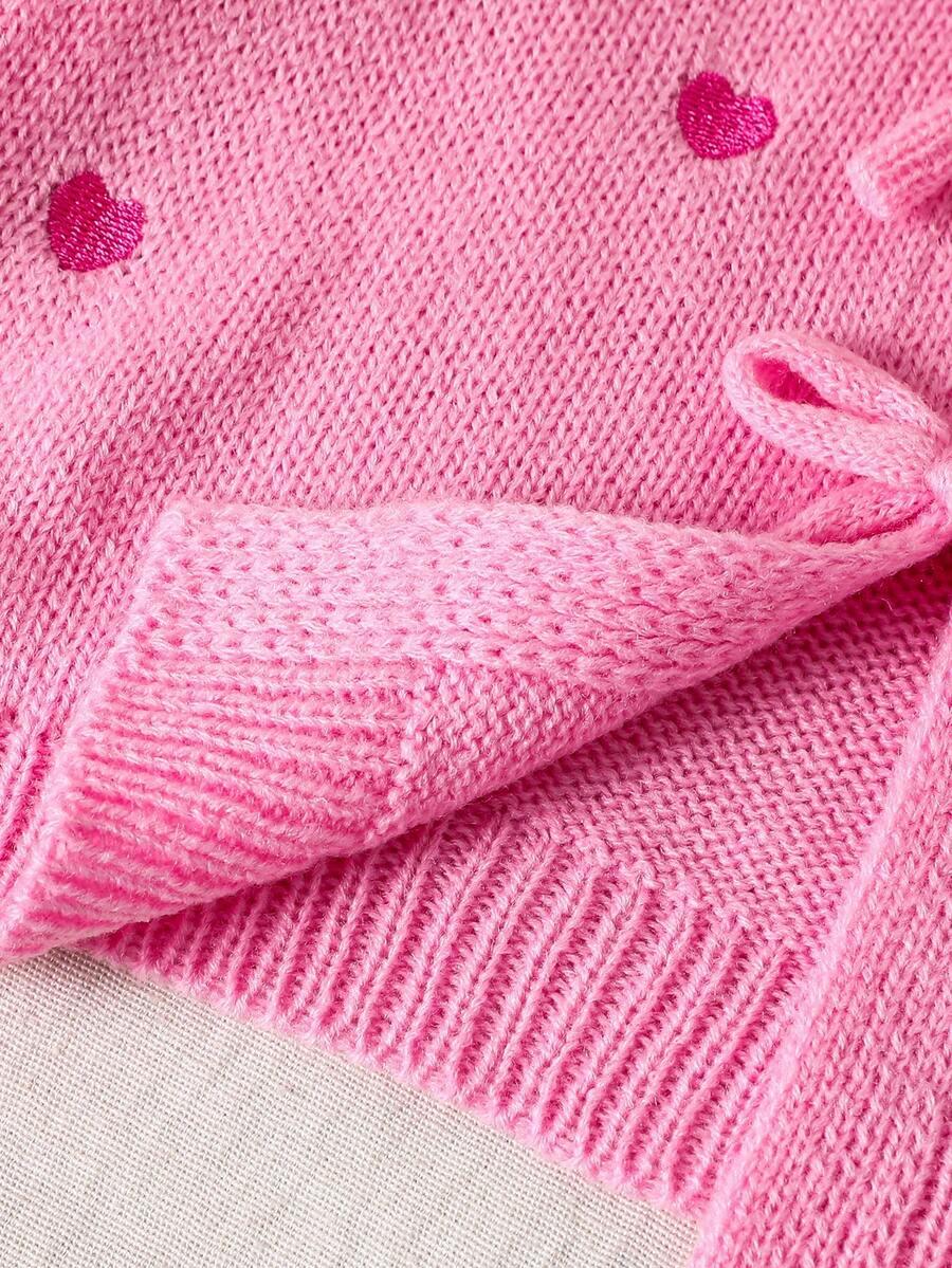 różowy sweter wiązanie