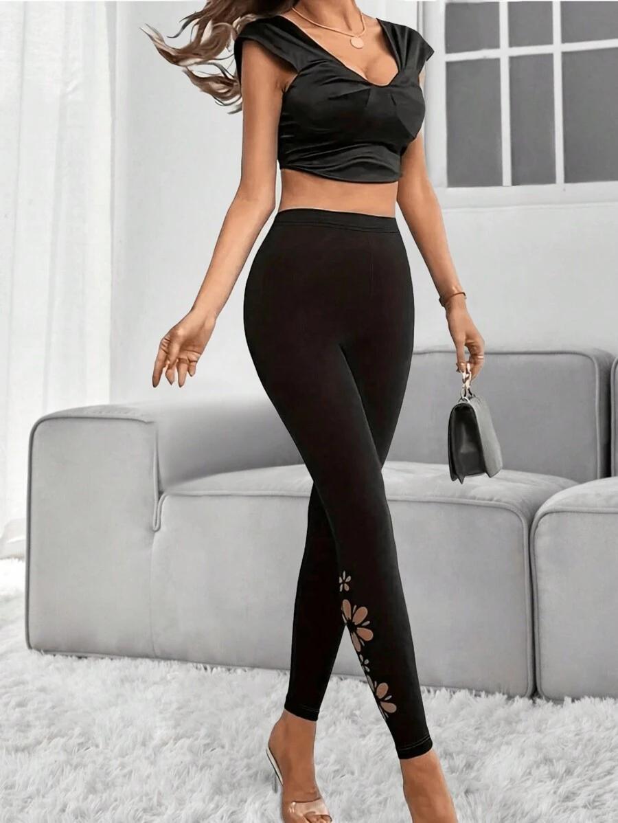 czarne legginsy z nadrukiem