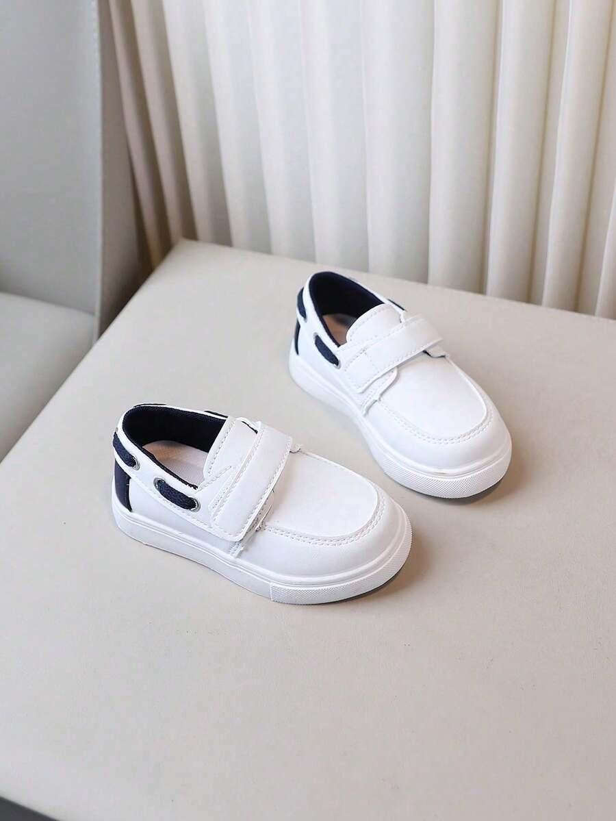 białe sportowe buty rzep