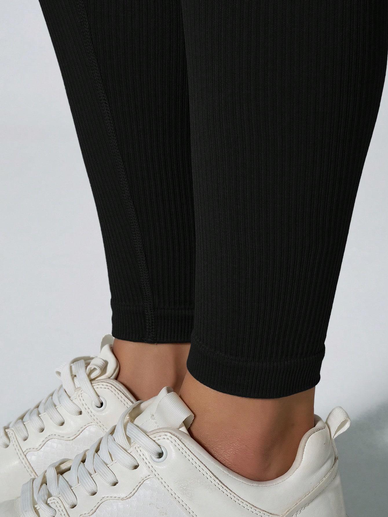 CZARNY KOMPLET TOP LEGGINSY PRĄŻKI 