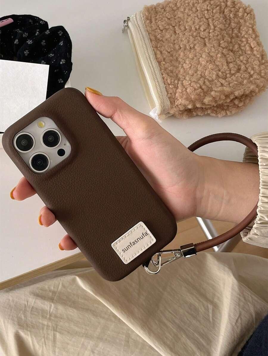 brązowe etui na telefon 