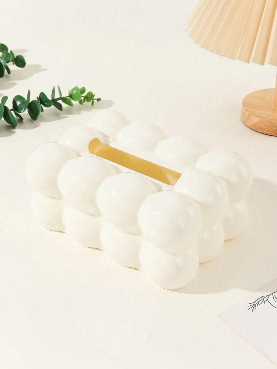 białe plastikowe pudełko na chusteczki