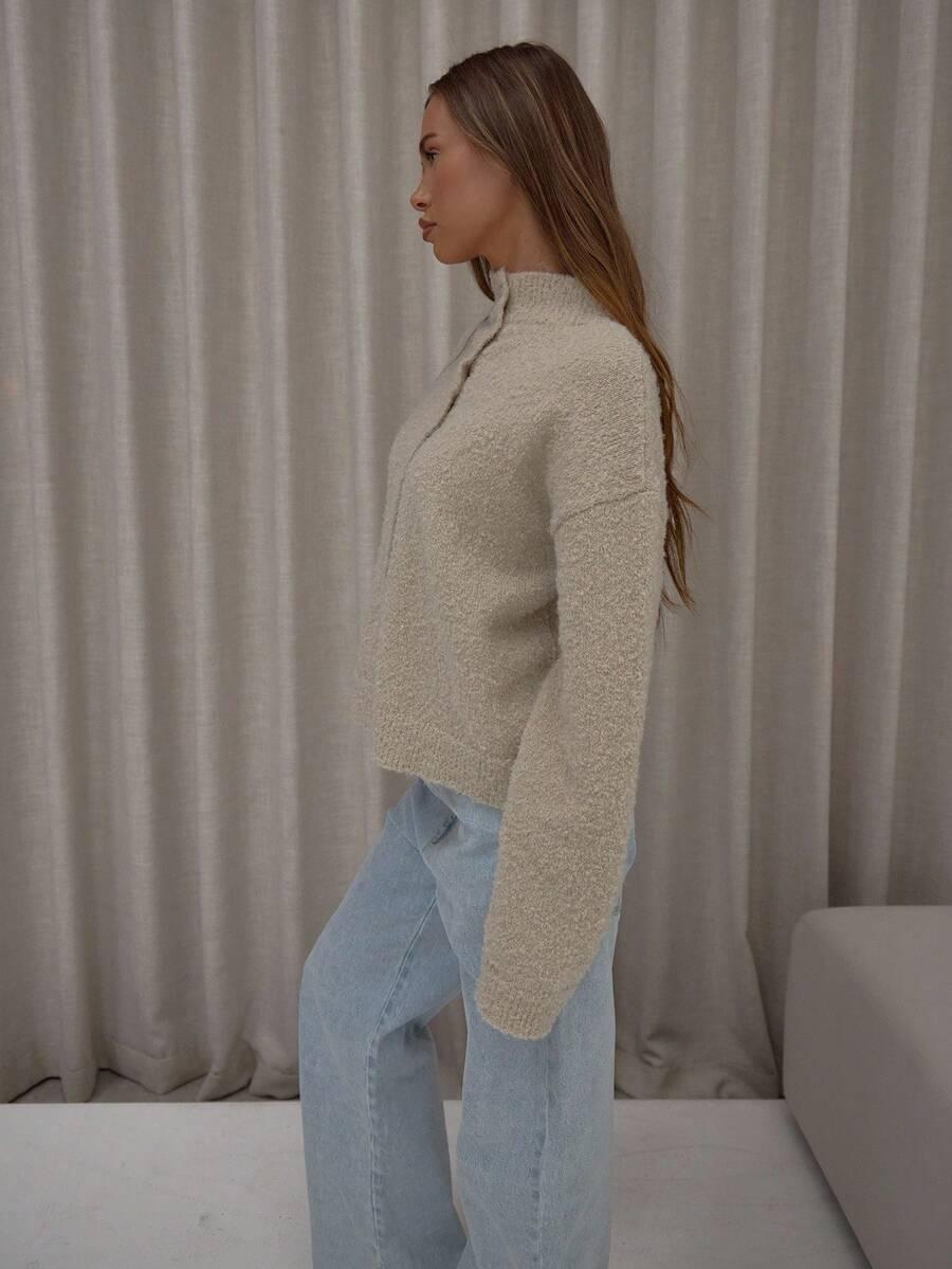 BEŻOWY SWETER STÓJKA