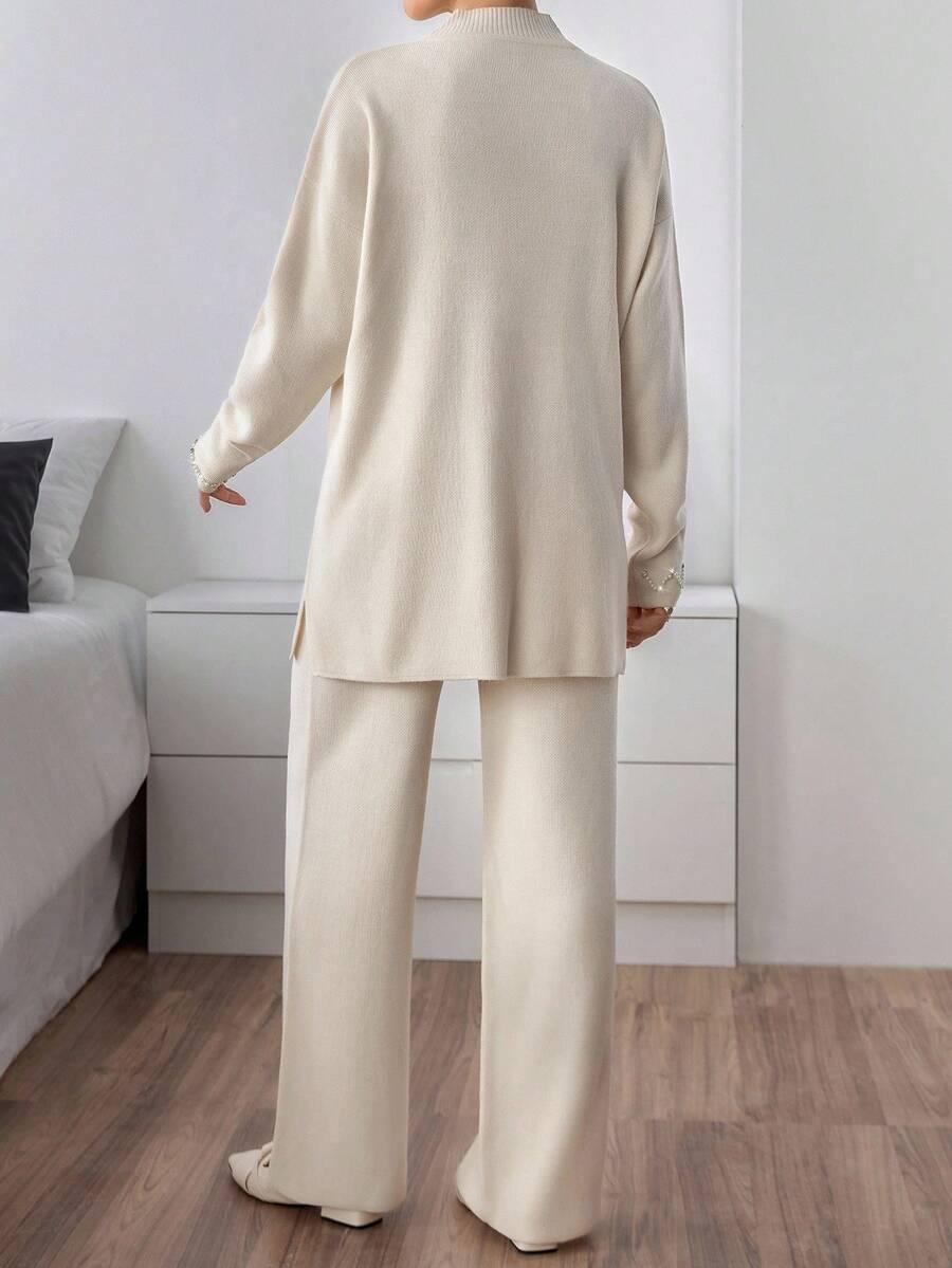 kremowy dzianinowy sweter 