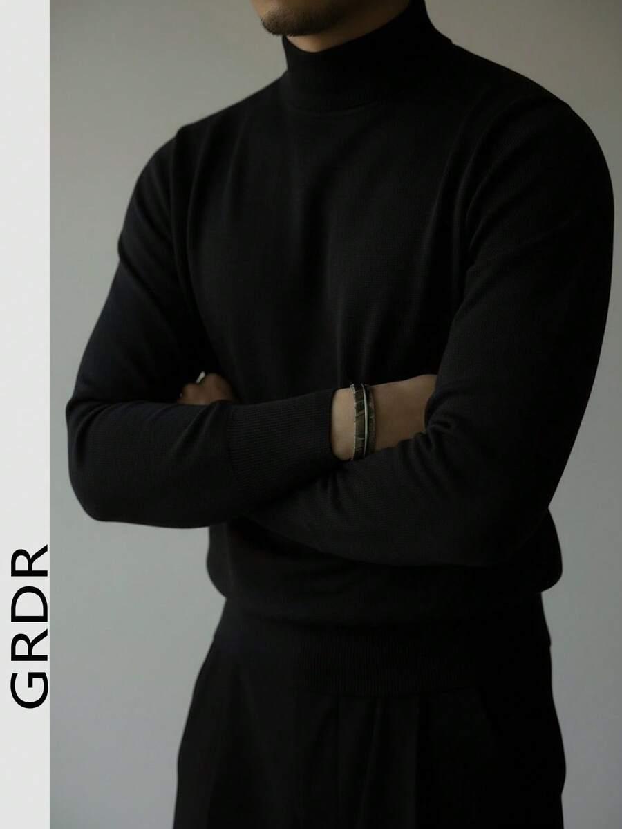czarny sweter golf