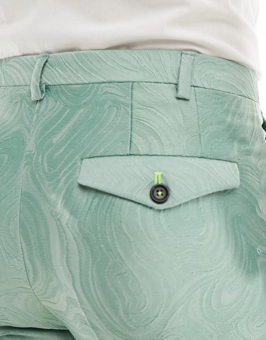 zielone eleganckie spodnie tekstura