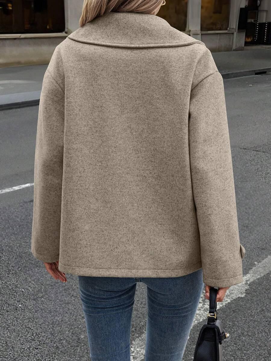 beżowy płaszcz guziki oversize