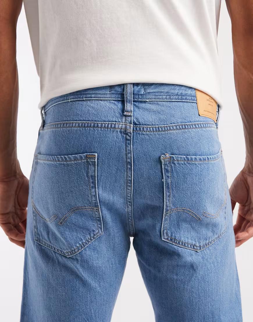 niebieskie spodnie jeans kieszenie