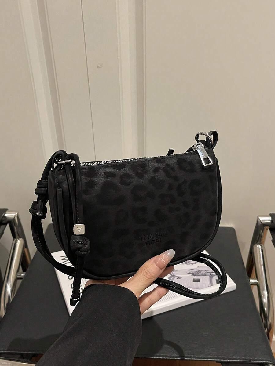 czarna torebka animal print