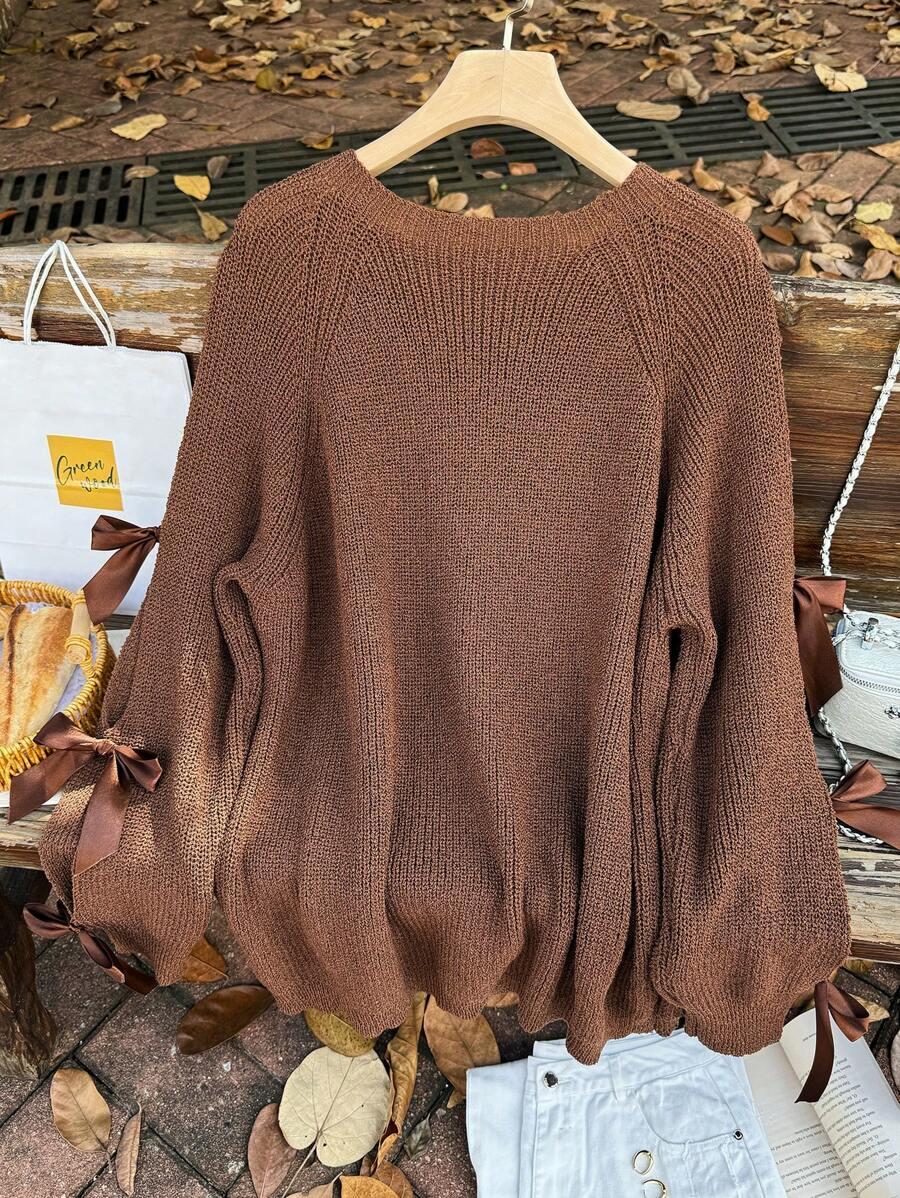 brązowy sweter kokarda