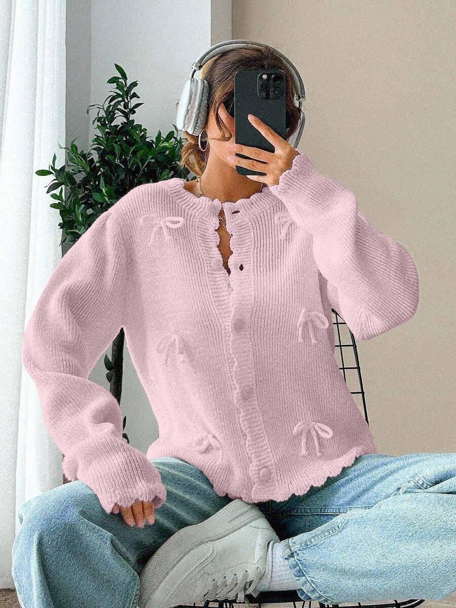 RÓŻOWY SWETER GUZIKI