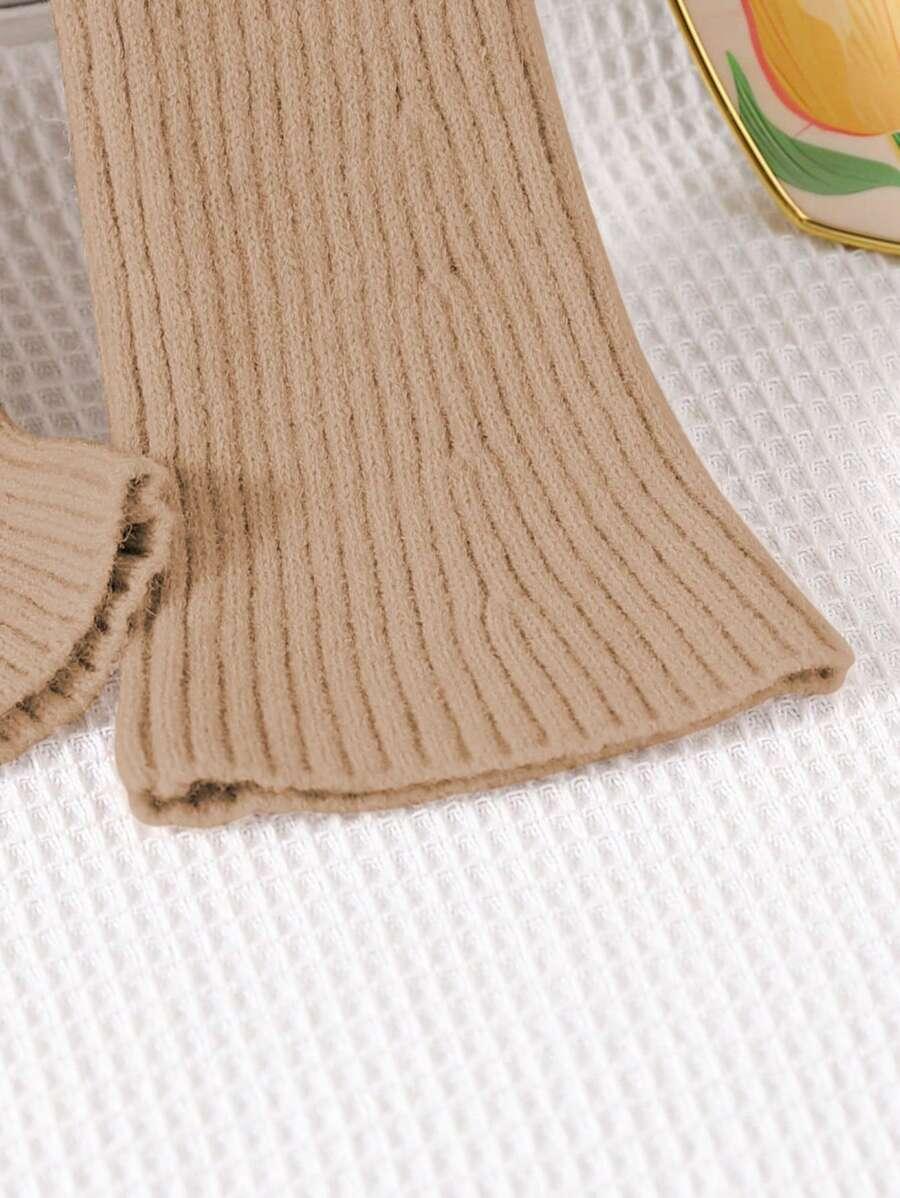 beżowy sweter golf