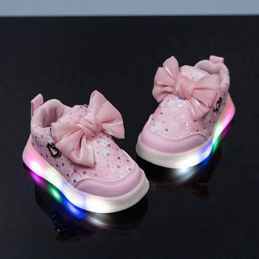 różowe święcące buty