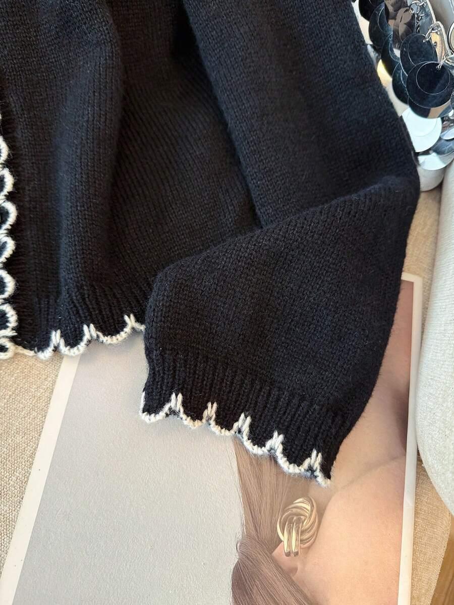 CZARNY SWETER GUZIKI