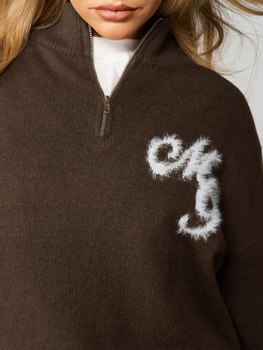 brązowy sweter zamek