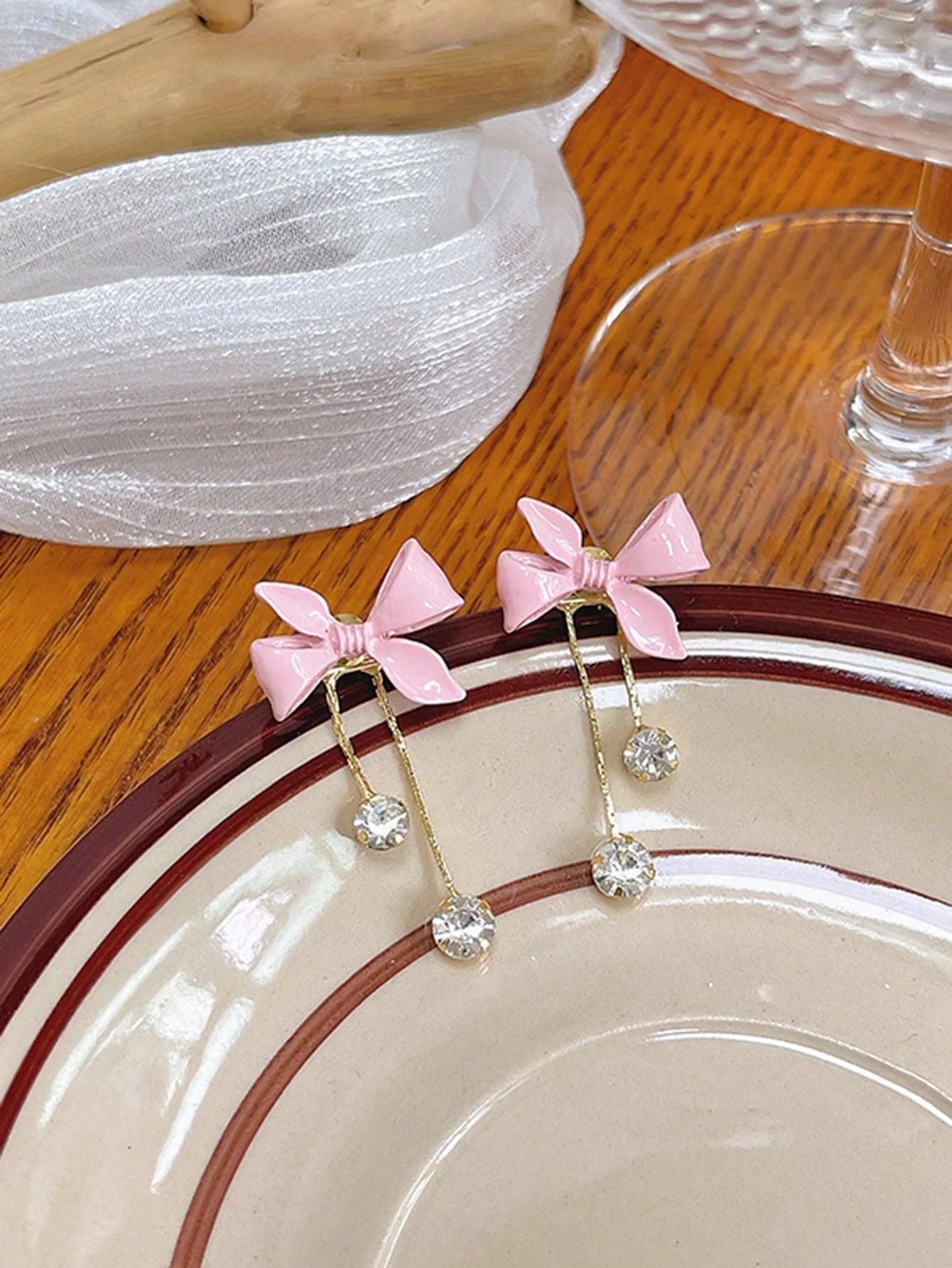 różowe kolczyki kokarda