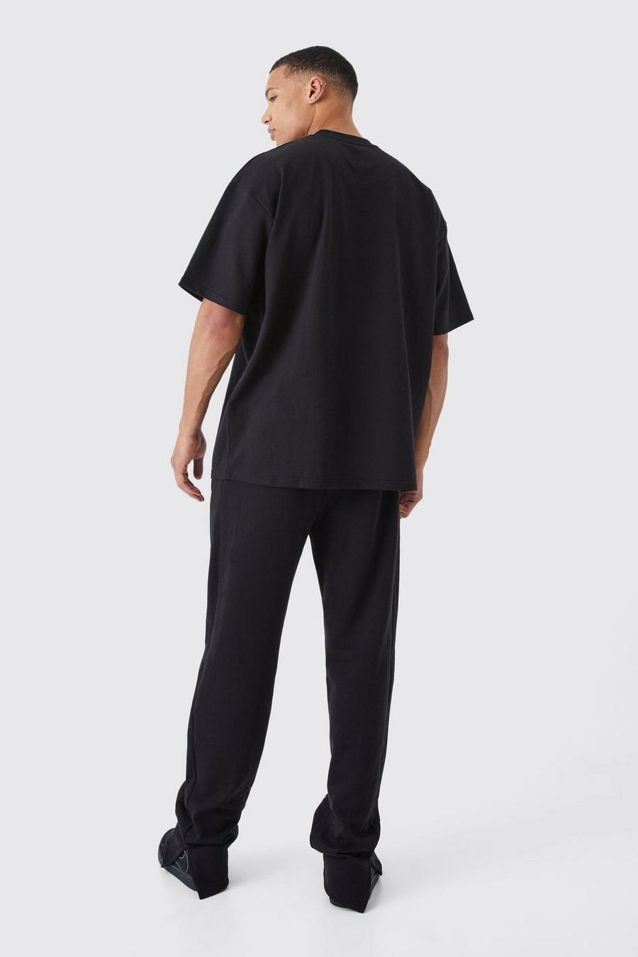 czarne dresowe spodnie nadruk print