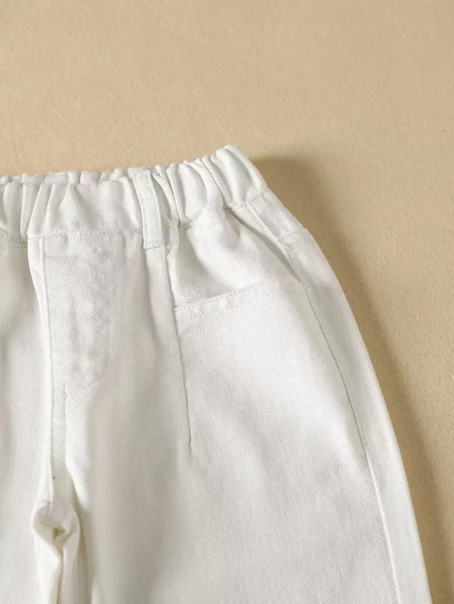 BIAŁE SPODNIE JEANS