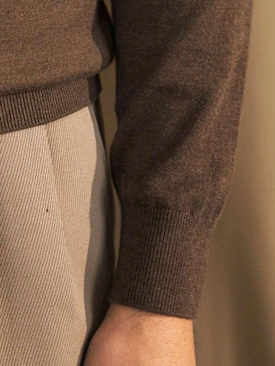 brązowy sweter golf