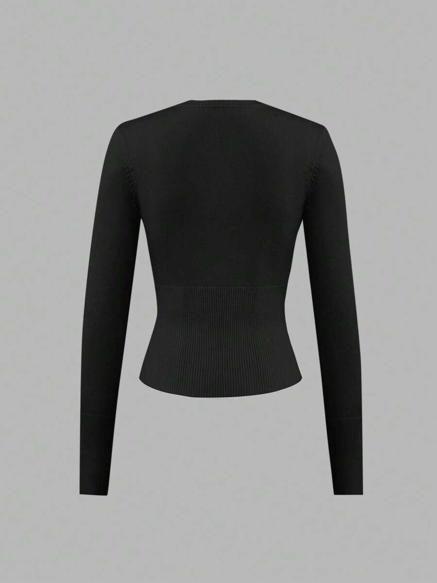 czarny sweter guziki