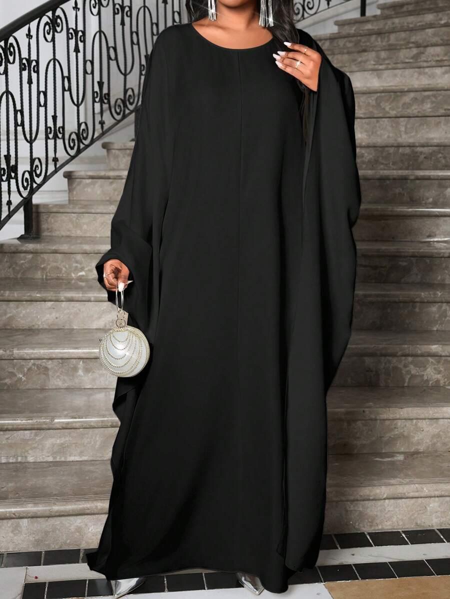 czarna sukienka oversize szerokie rękawy