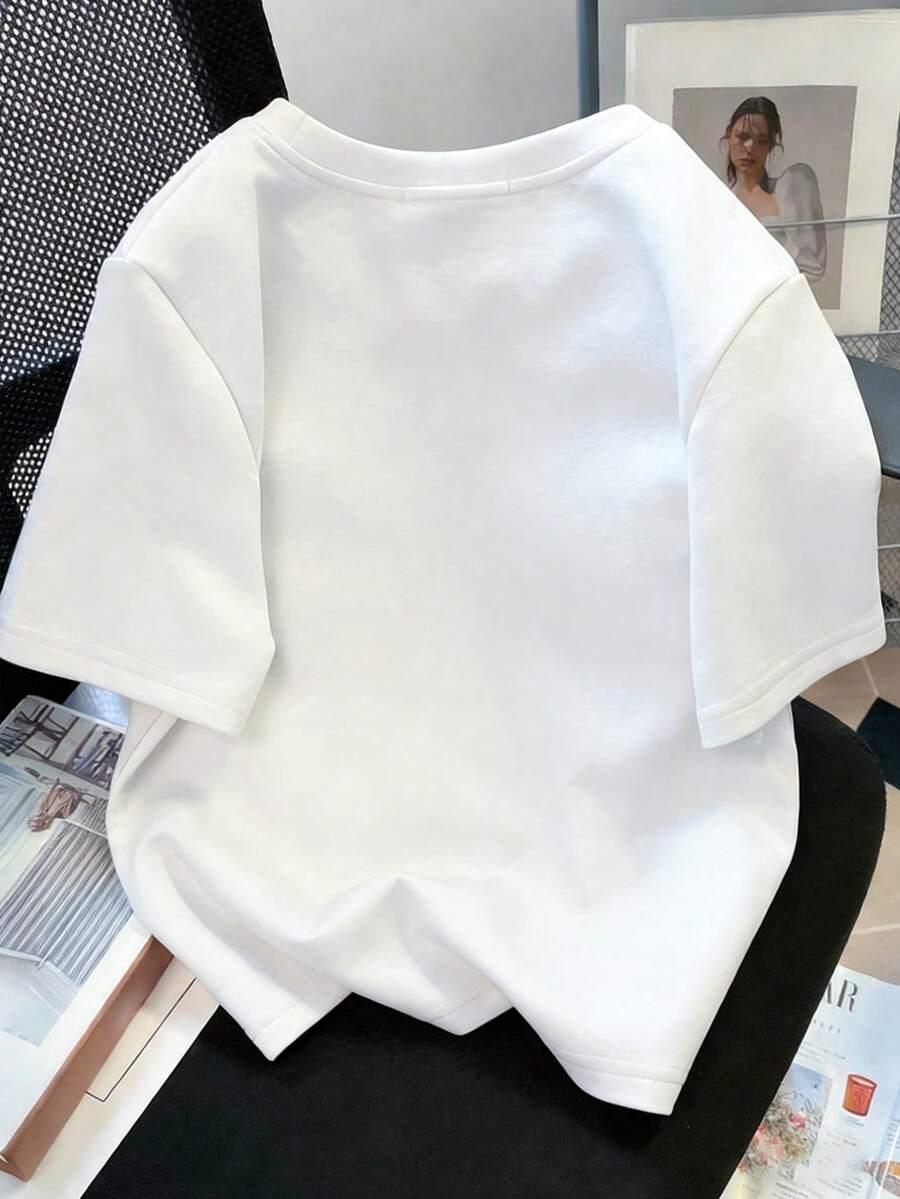 biały t-shirt kokardy