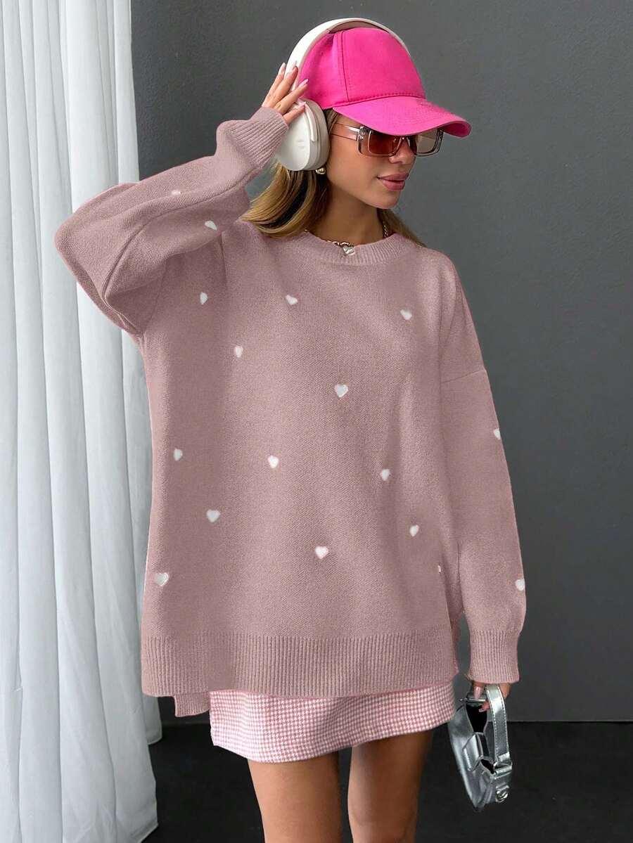 różowy sweter wzór serca