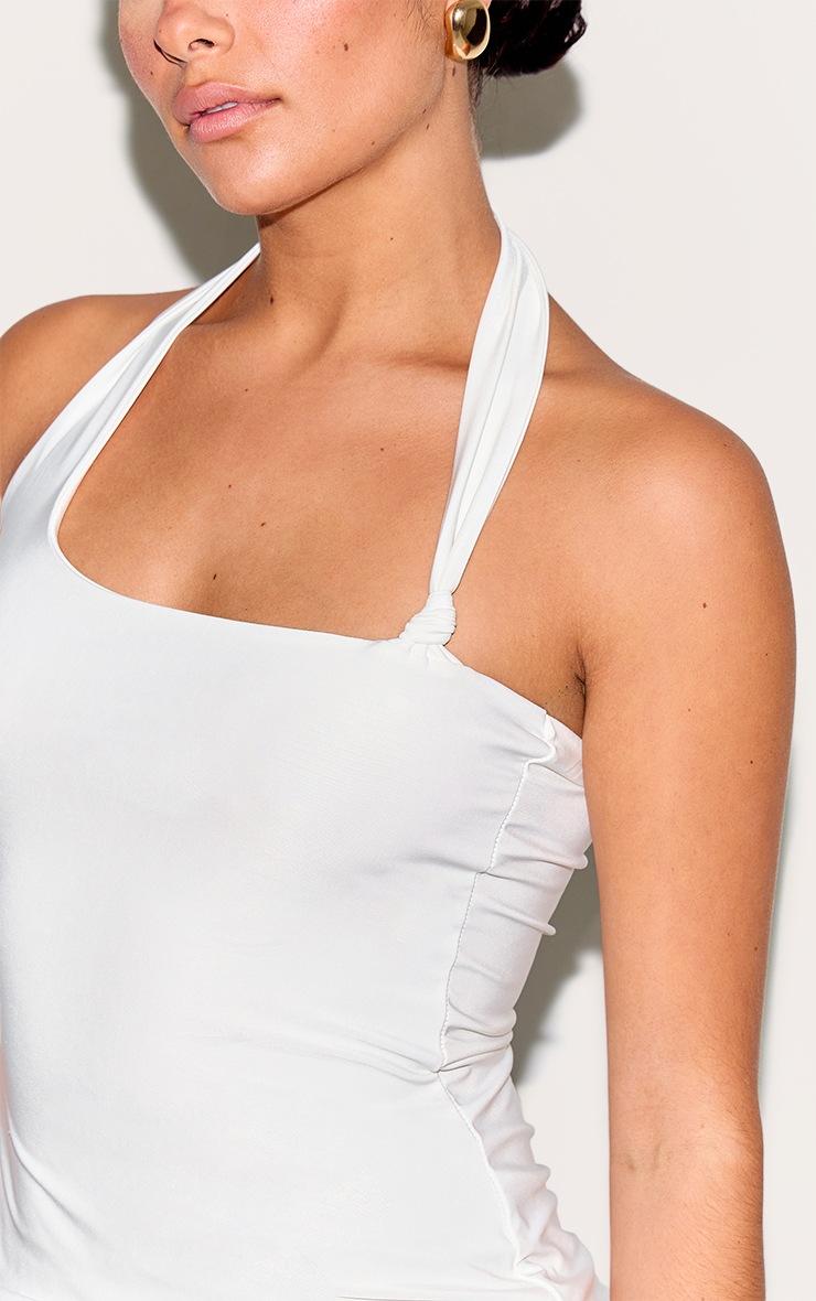 BIAŁY TOP ASYMETRYCZNY DEKOLT