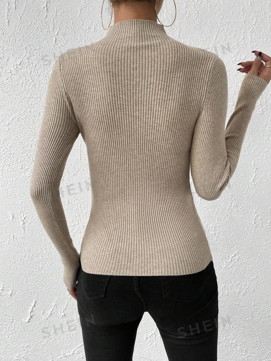 BEŻOWY SWETER GOLF