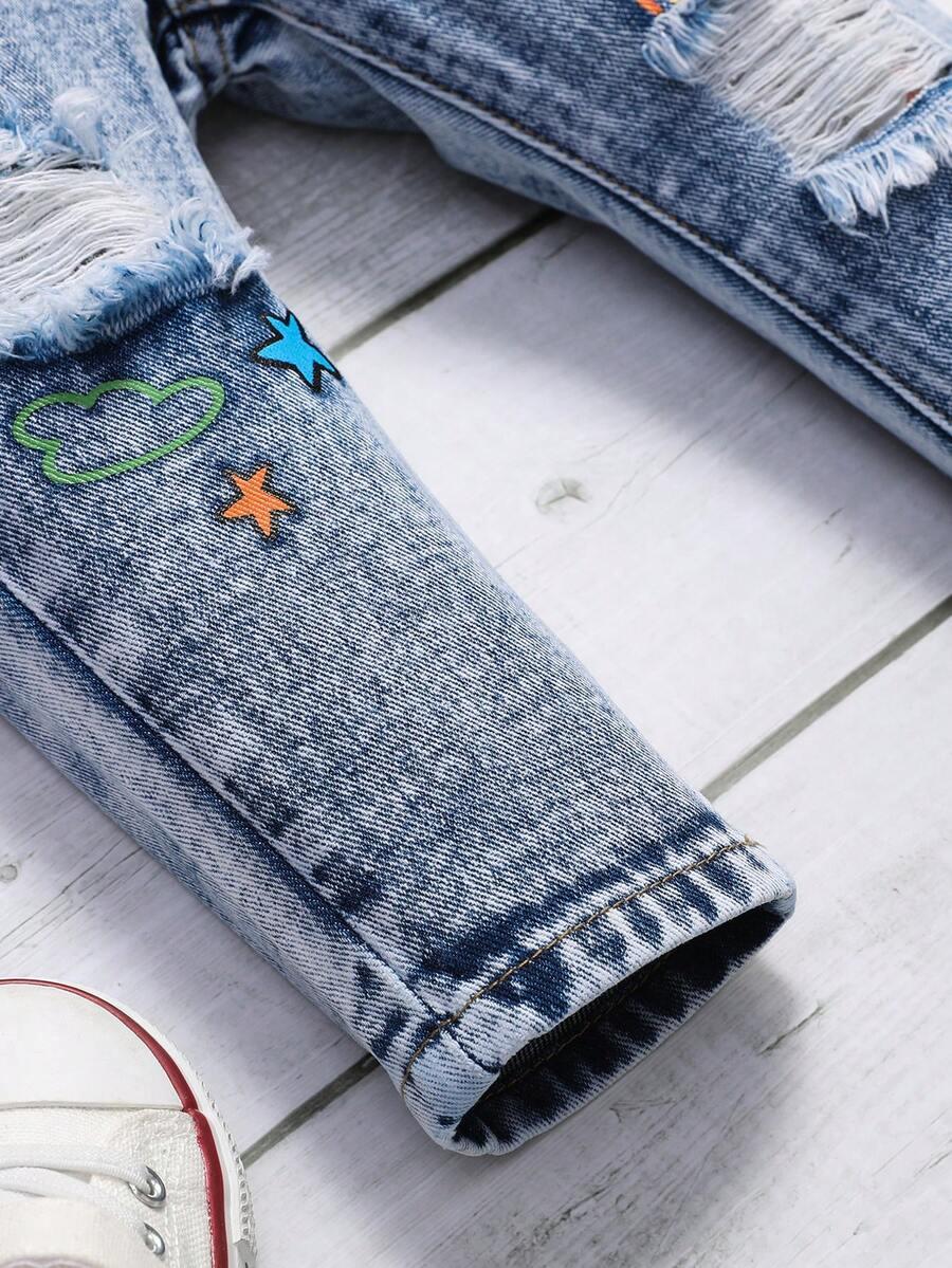 niebieskie spodnie jeans 