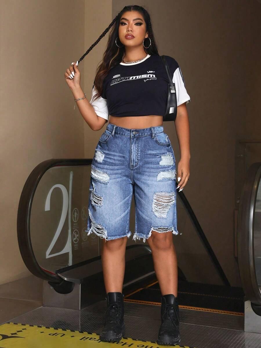 NIEBIESKIE SPODENKI JEANS PRZETARCIA 
