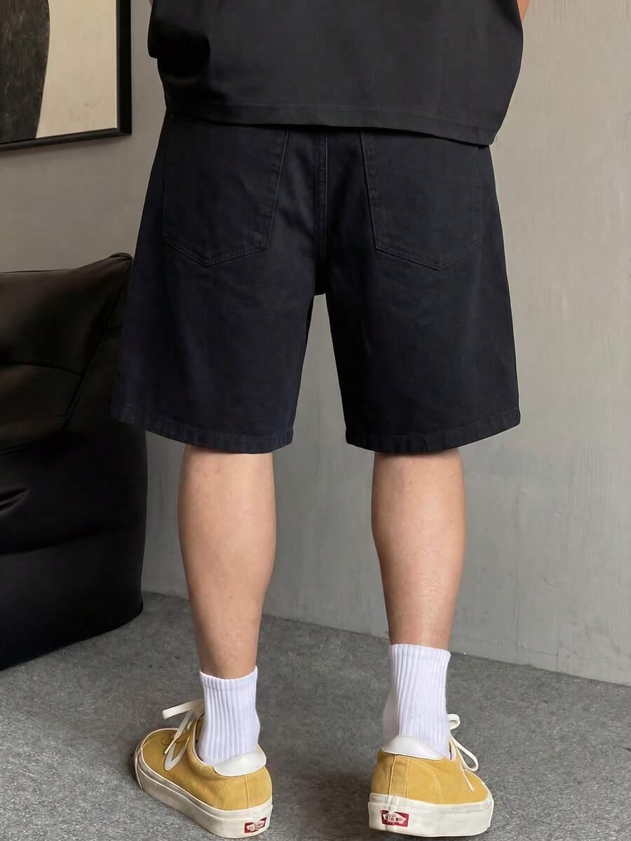 czarne spodenki jeans