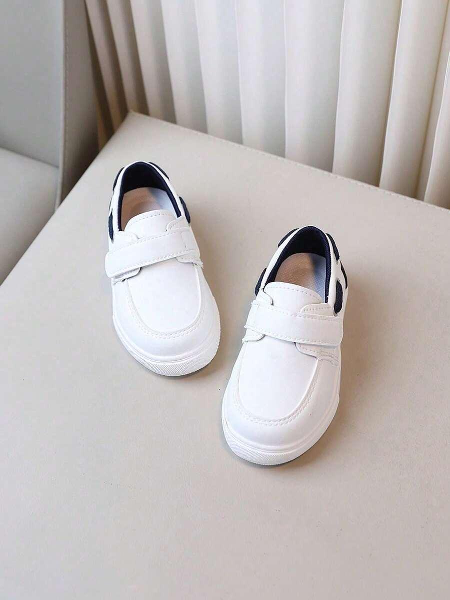 białe sportowe buty rzep
