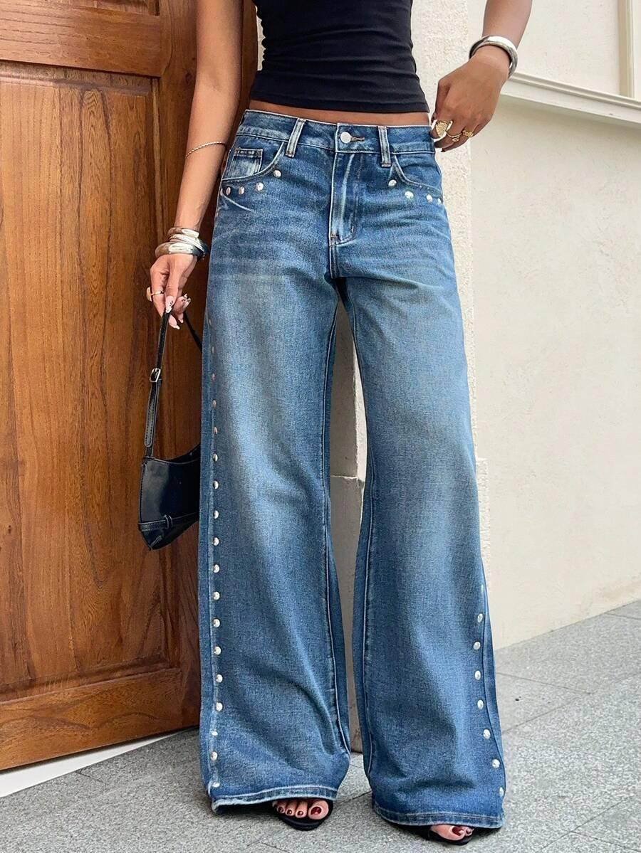 niebieskie spodnie jeans kieszenie 
