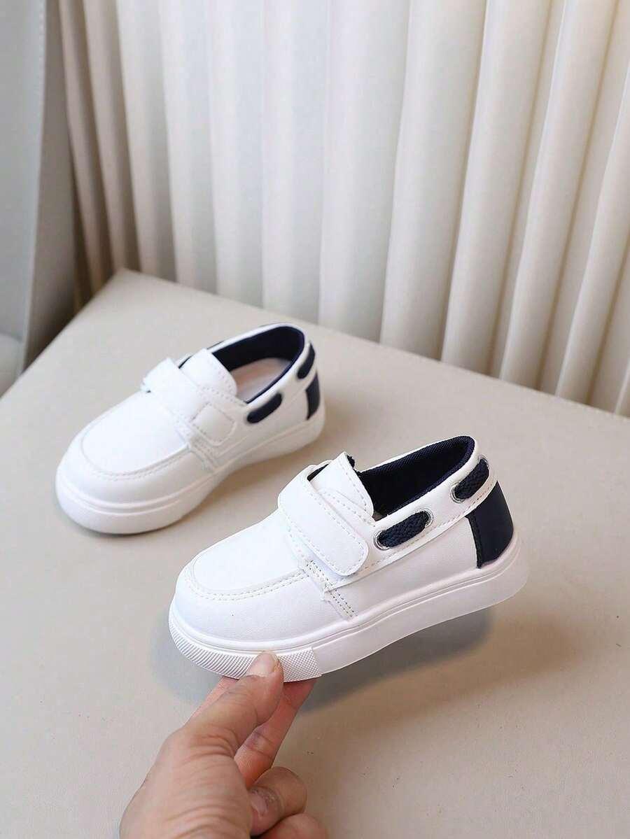 białe sportowe buty rzep