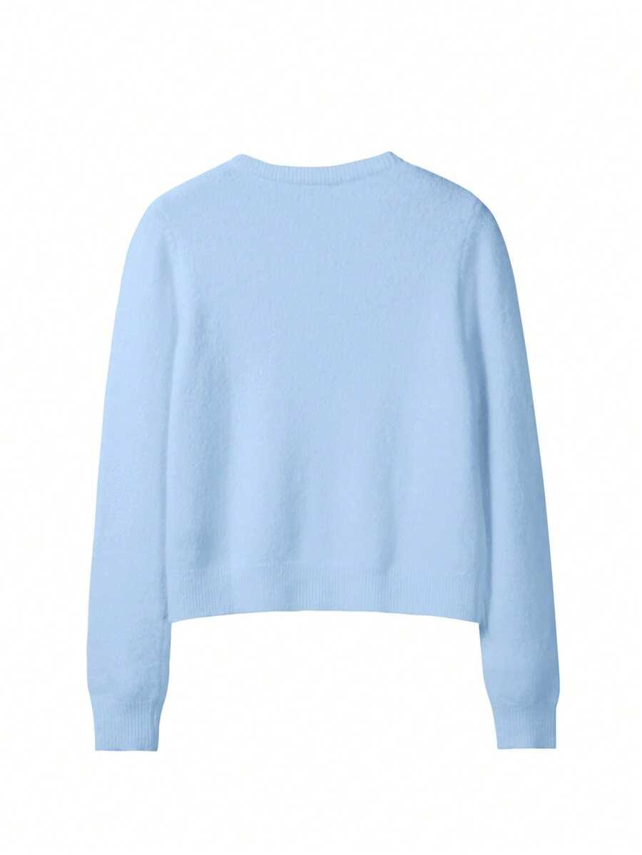 niebieski sweter guziki