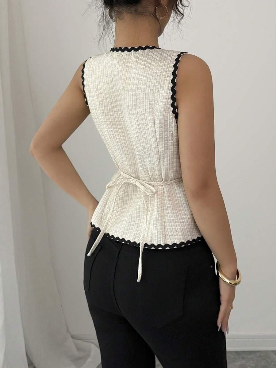 ELEGANCKA KAMIZELKA GUZIKI