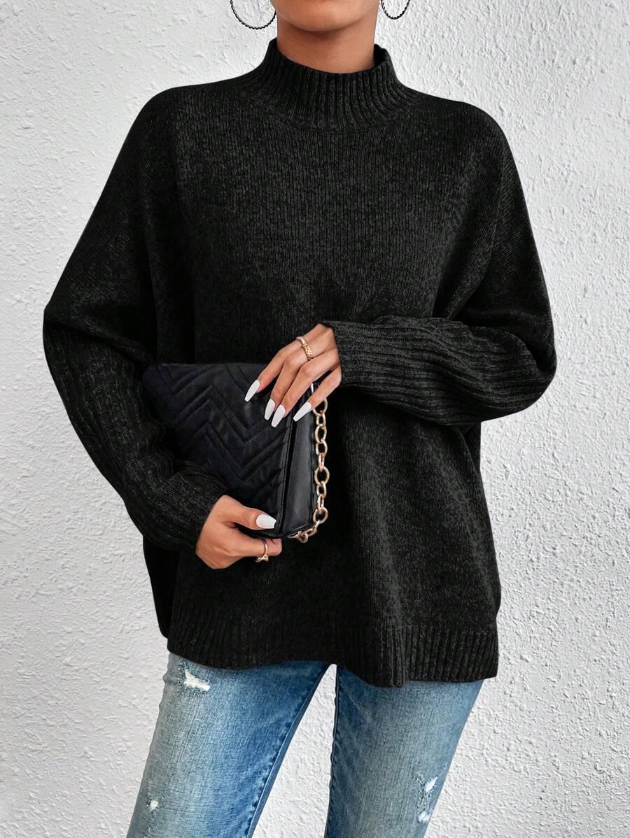 CZARNY LUŹNY SWETER