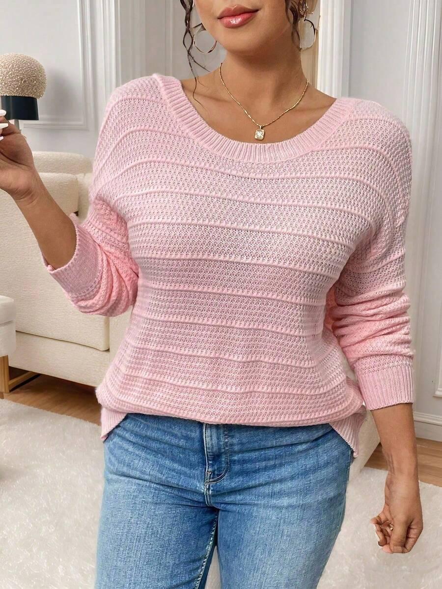 różowy sweter kokarda 