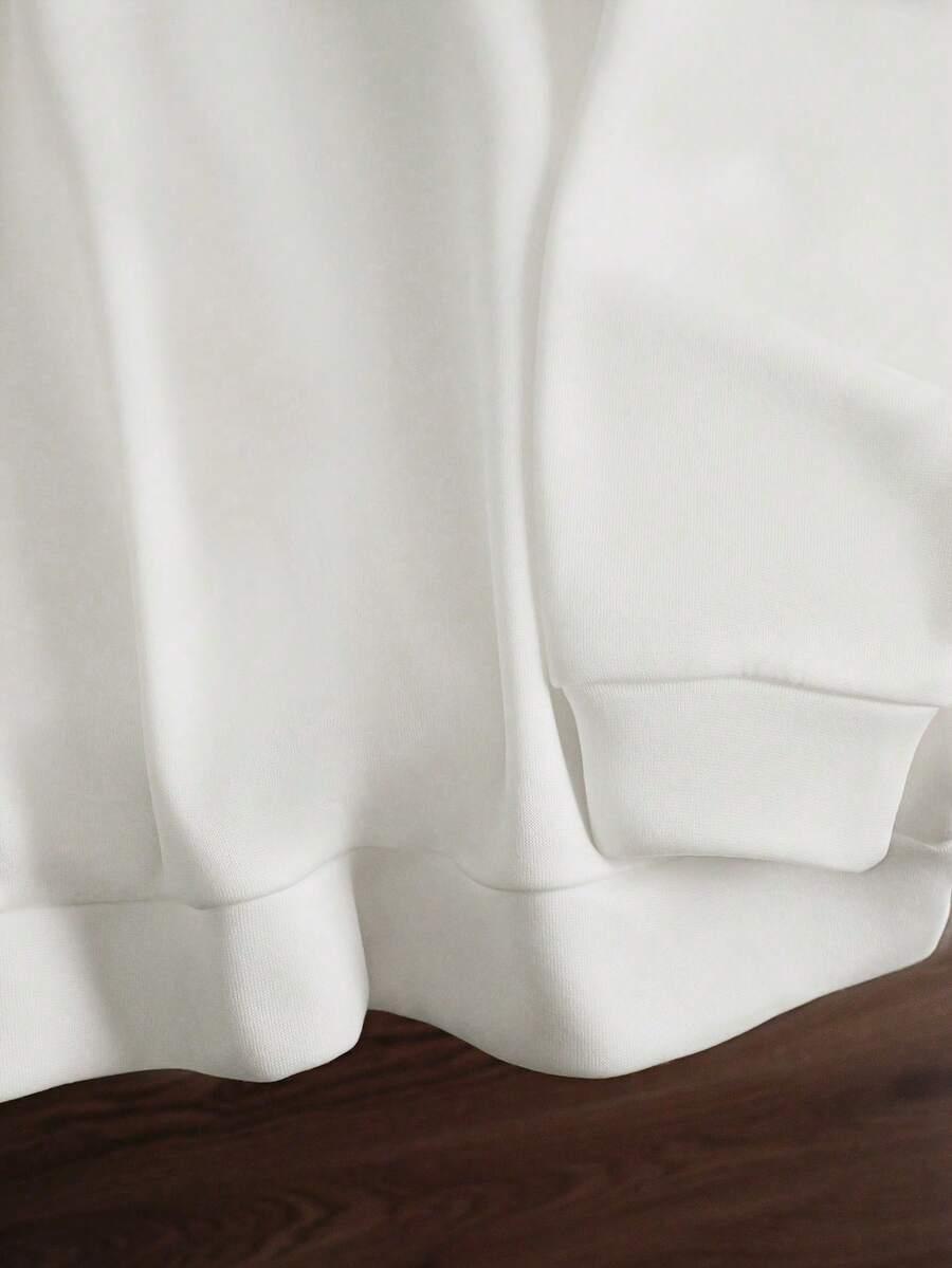 BIAŁA BLUZA OVERSIZE