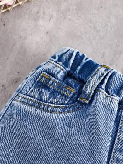 niebieskie spodnie jeans kokardy 
