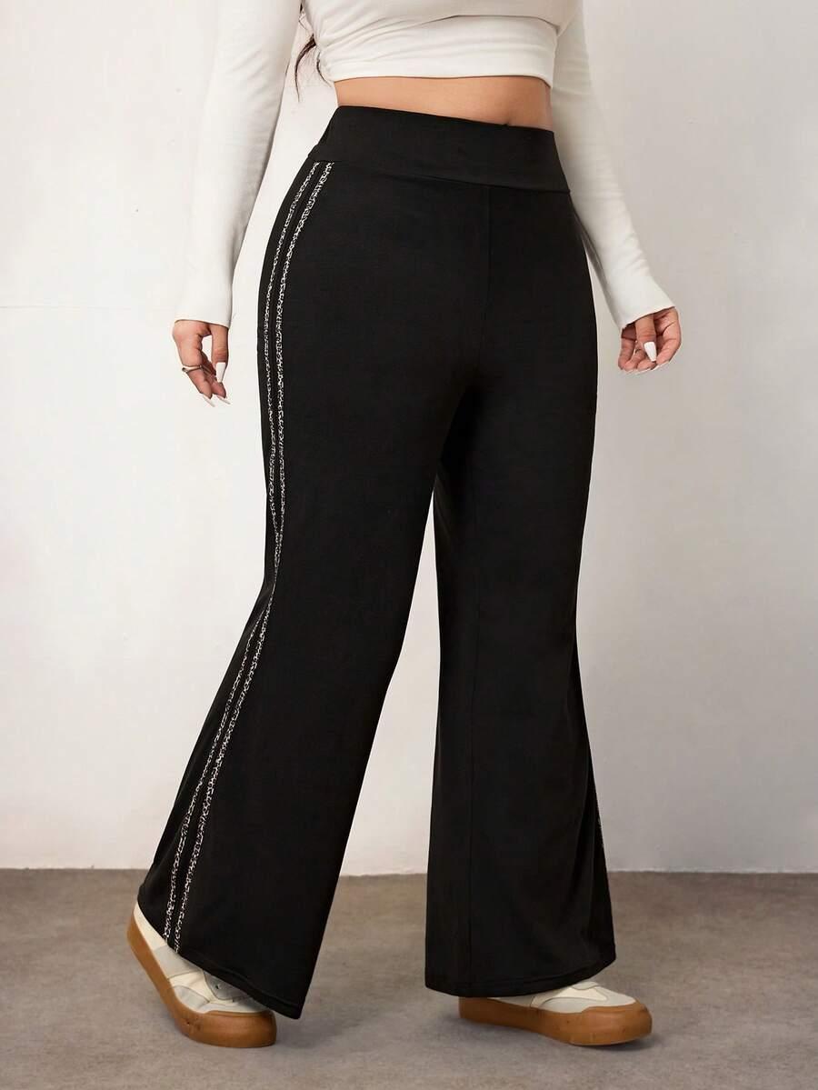 CZARNE SPODNIE DRESOWE animal print