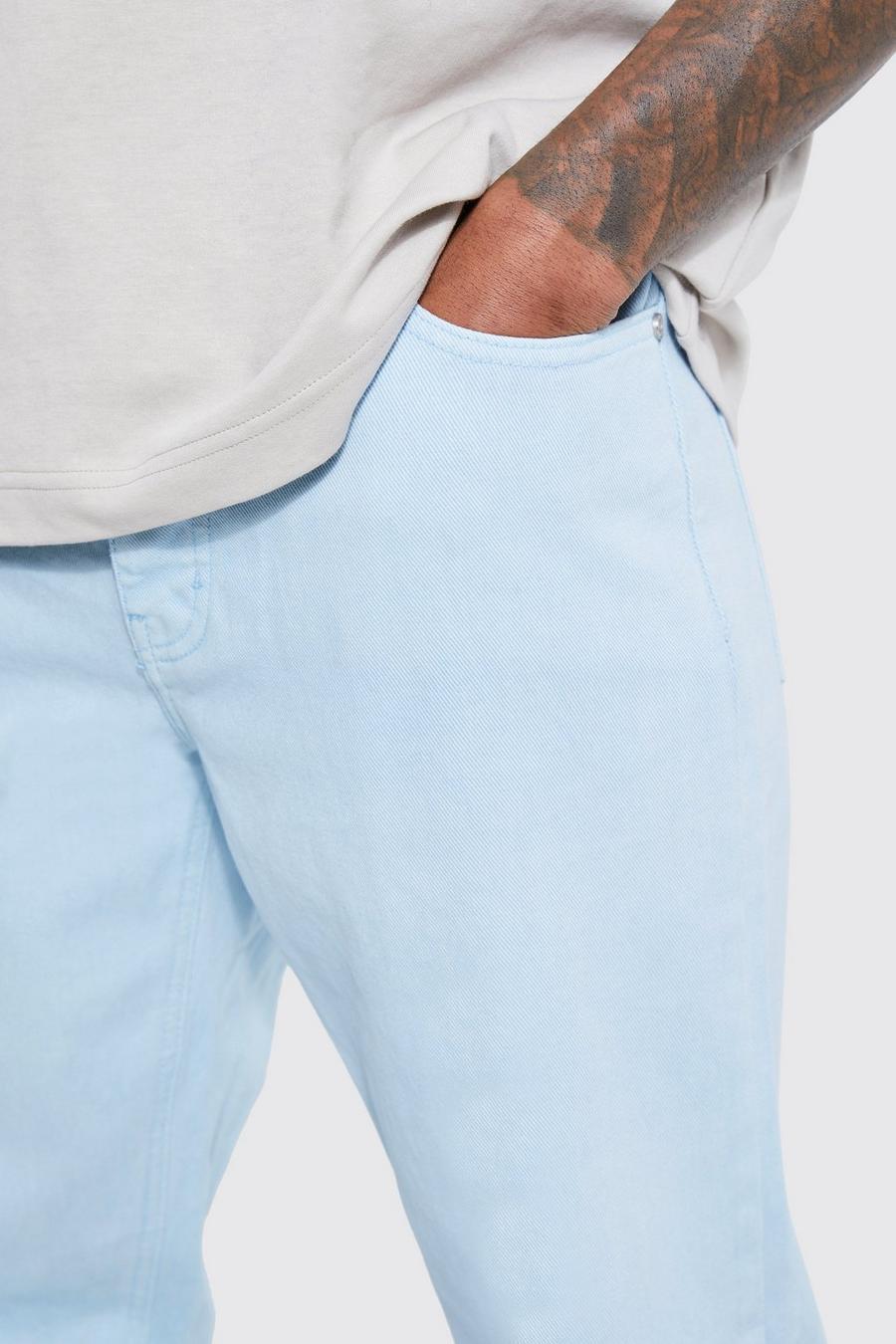 niebieskie spodnie jeans kieszenie guziki