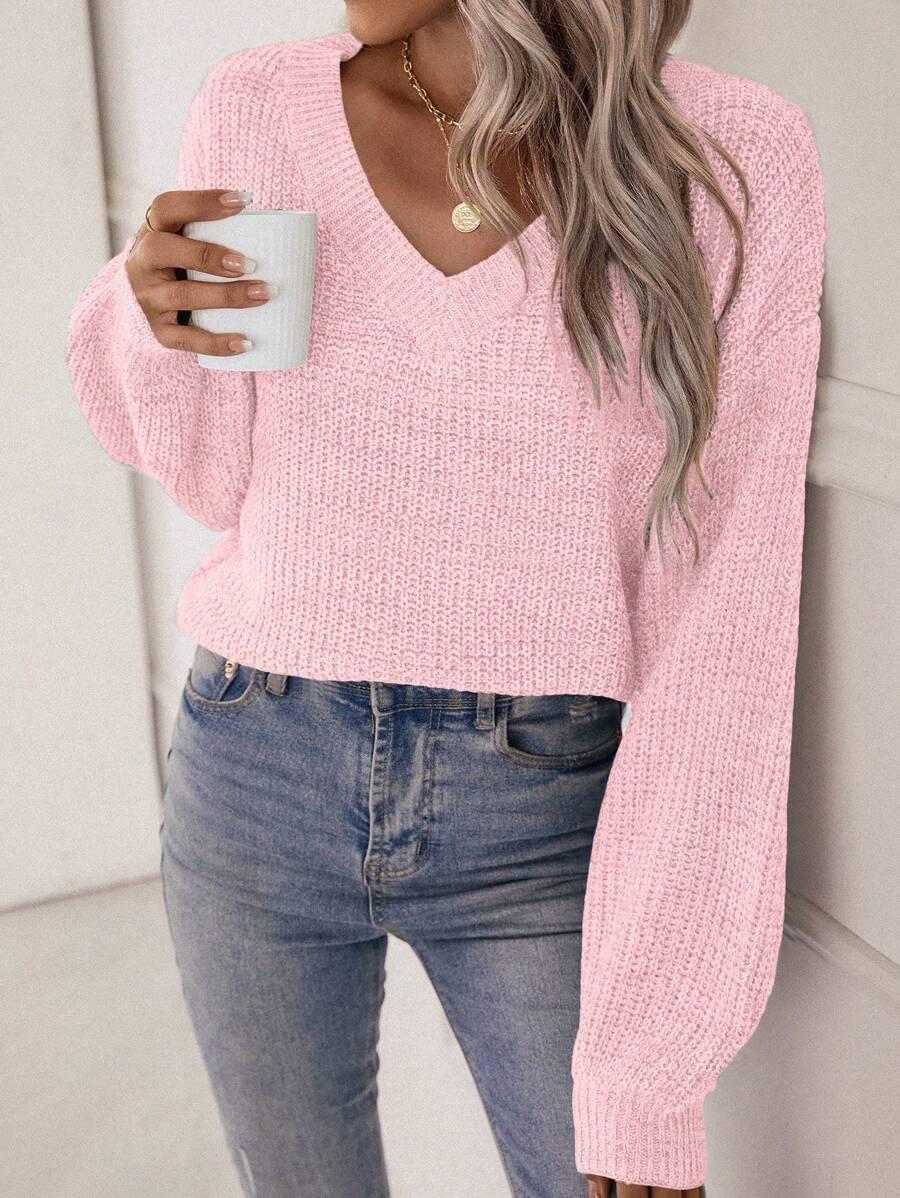 różowy sweter v-neck