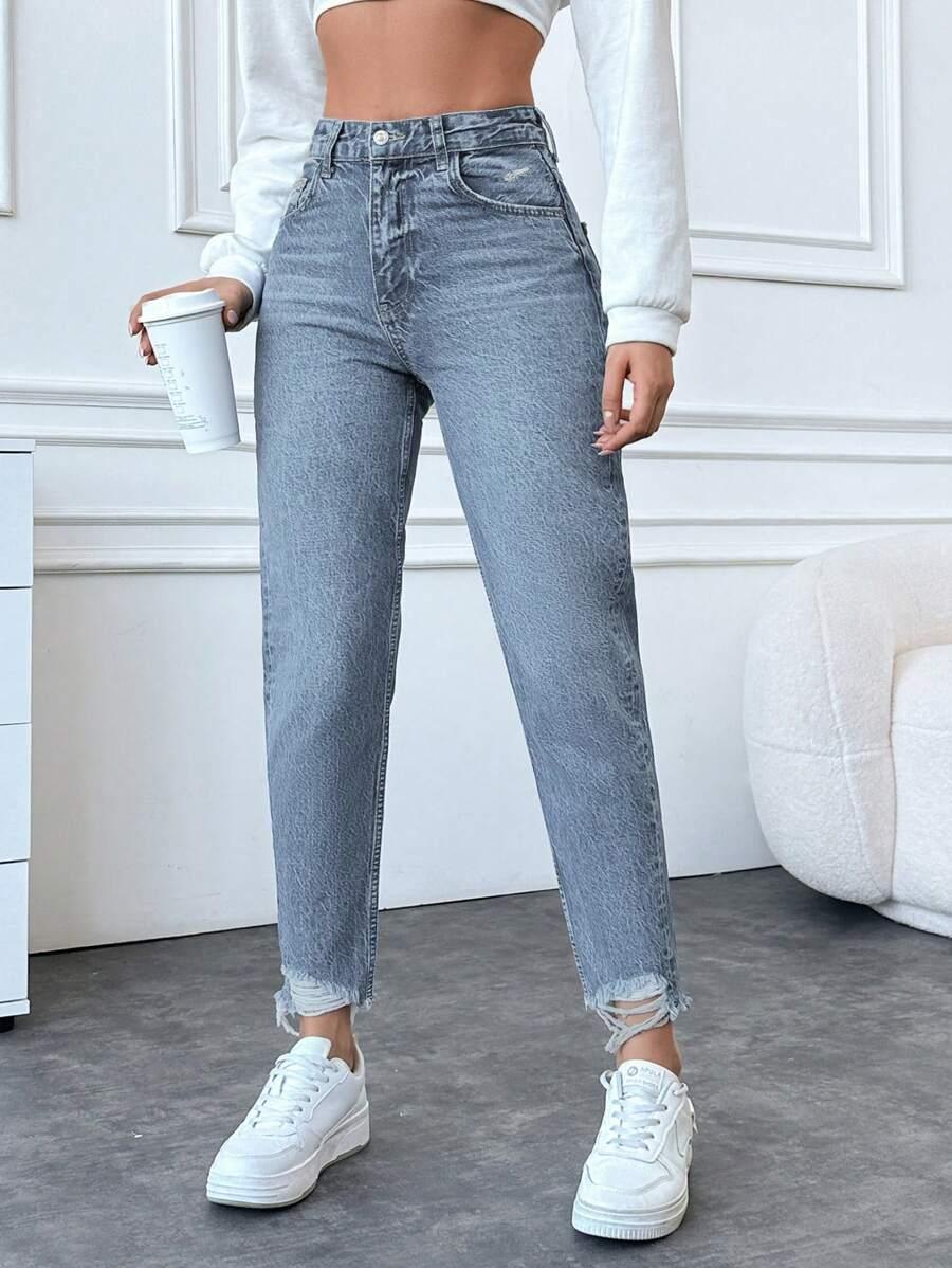 niebieskie spodnie jeans rurki przetarcia