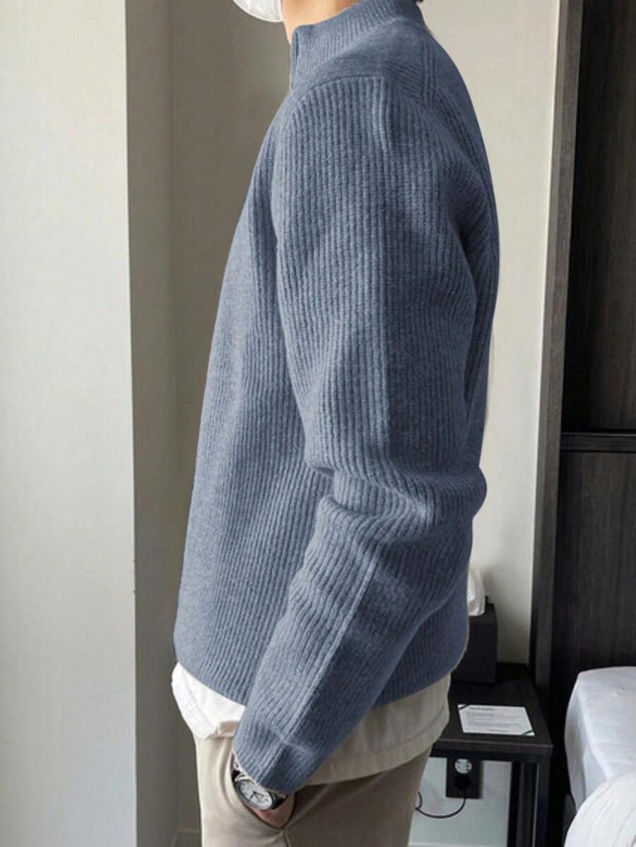 niebieski sweter zamek